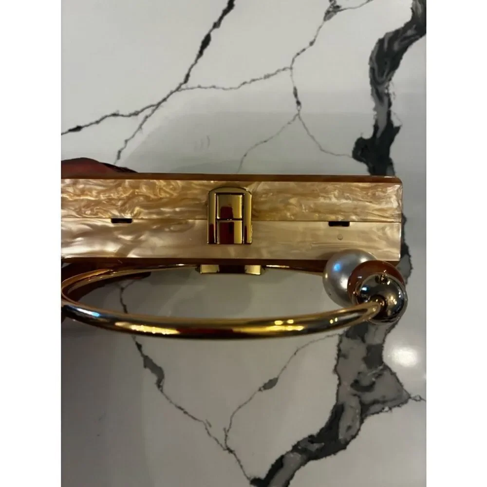 Lulu's Pearlescent Pink Acrylic Box Clutch with Gold Ring Handle